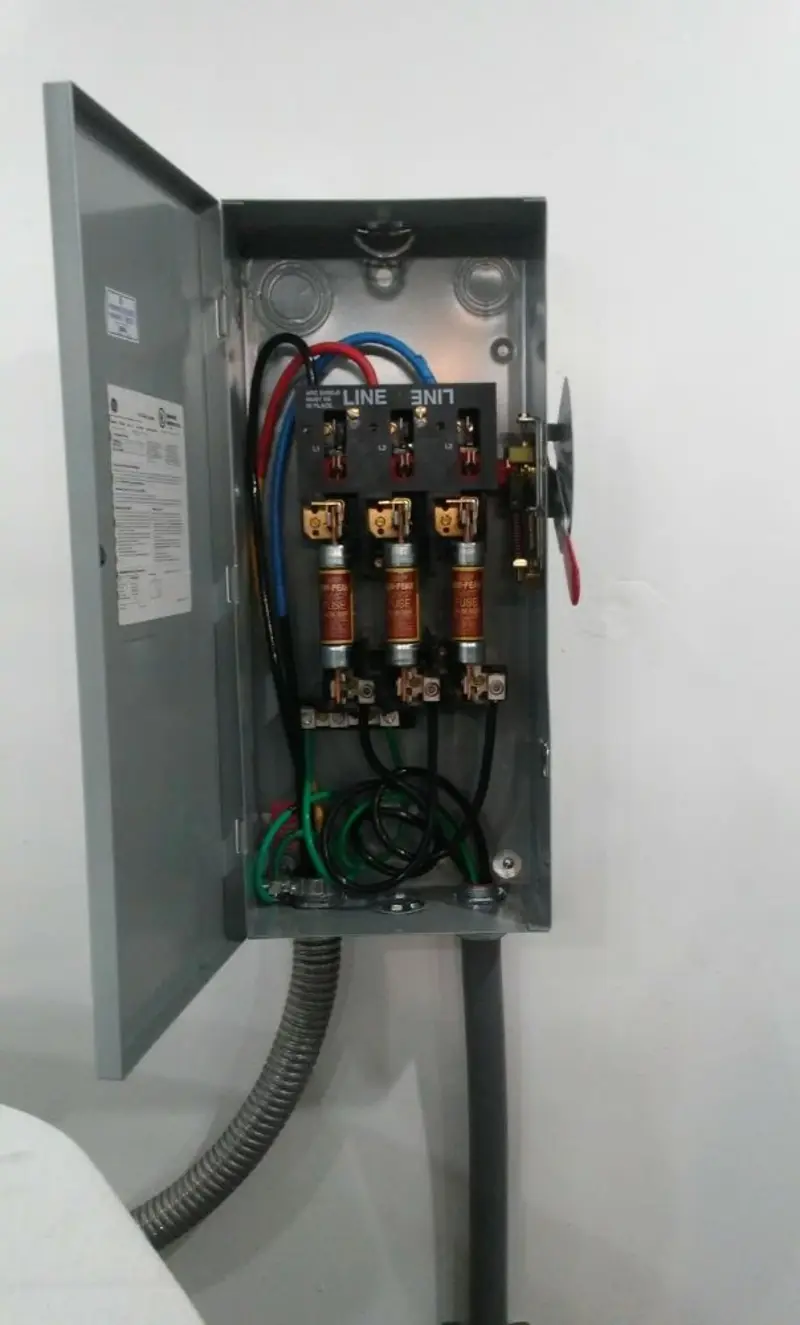 Three-phase disconnect switch installed for Smoke Detector Installation in Hopedale